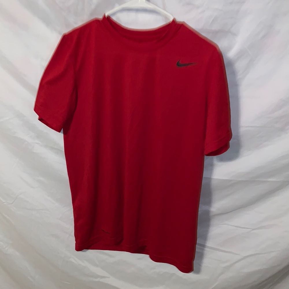 Medium red Nike dry fit t-shirt.